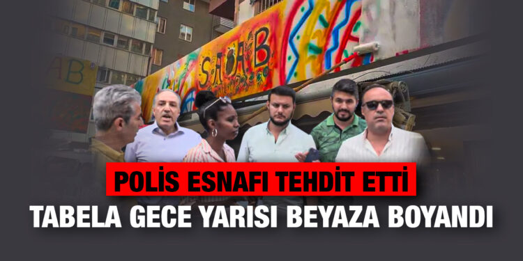 Somalili esnafın tabelasını polis gece yarısı zorla beyaza boyattı